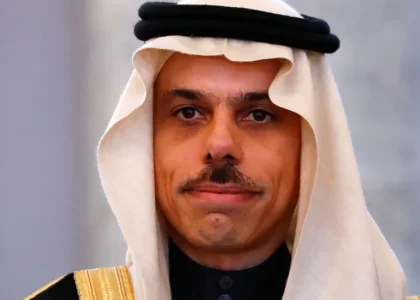 Saudi Foreign Minister Prince Faisal bin Farhan speaking in a formal diplomatic setting.