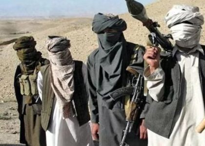 Security personnel stand near a road checkpoint in Pakistan's Balochistan province.