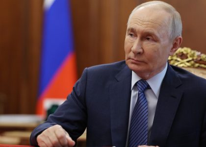 Russian President Vladimir Putin speaking during a government meeting.