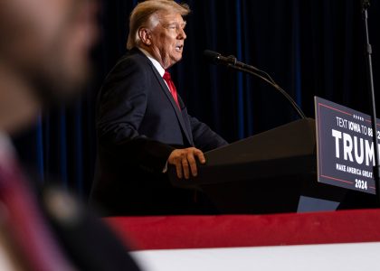 Donald Trump and senior defense officials attend the transfer of fallen U.S. service members at Dover Air Force Base.