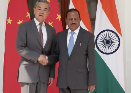 Ajit Doval and Wang Yi sit across from one another during boundary talks in Beijing.