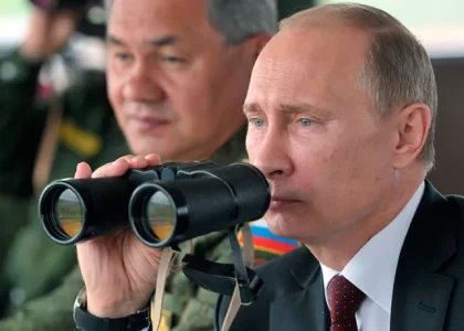 Vladimir Putin chairs a meeting with members of Russia's Security Council.
