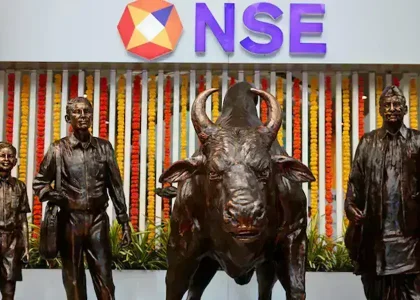 People speak inside the National Stock Exchange building in Mumbai.